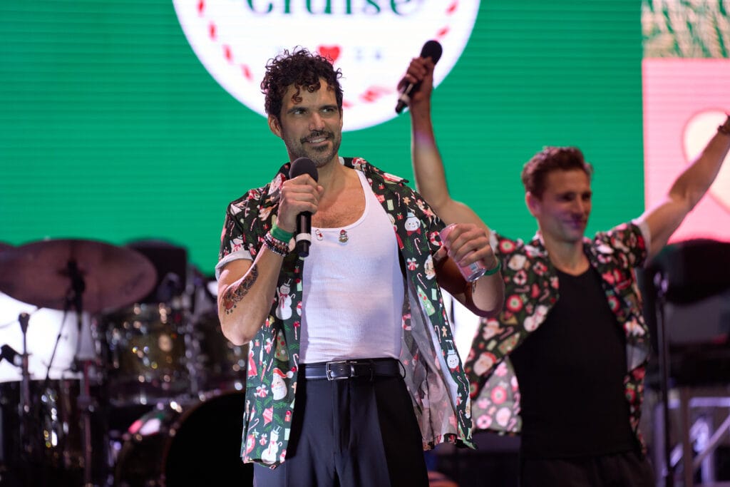 Benjamin Ayres and Andrew Walker on stage at the Hallmark Christmas Cruise. Watch Christmas at Sea on Hallmark Channel to see fans meet Hallmark stars.