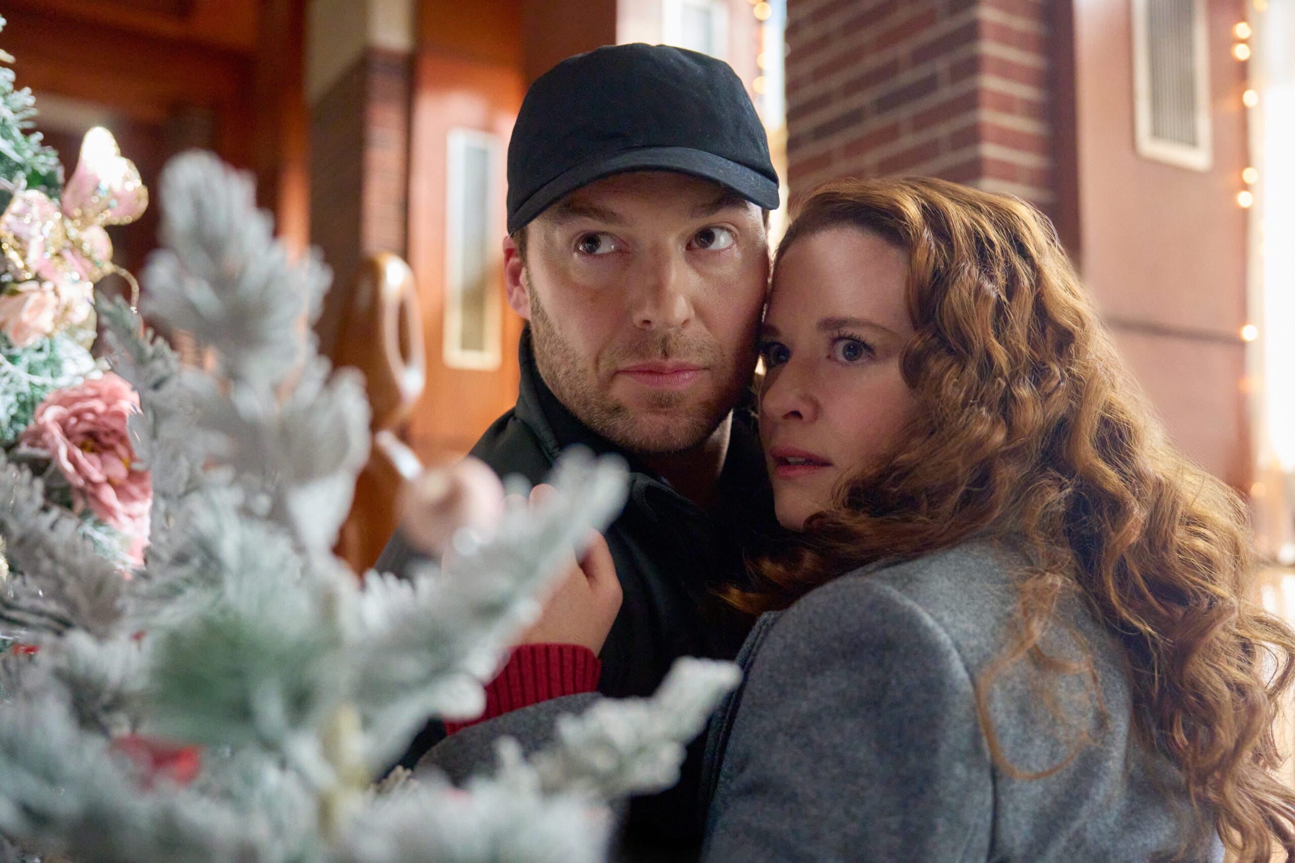 Photos of Sam and Emily from Mistletoe Murders Season 2 | Mistletoe Murders Season 2 Episodes 3 - 4 deliver high-stakes art-world intrigue as Emily and Sam uncover secrets, lies, and holiday twists in The Ides of December.